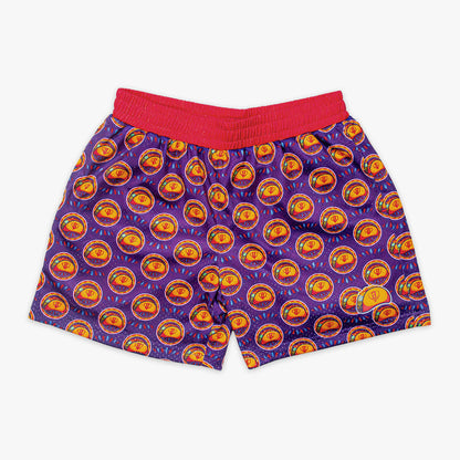 Red and purple shorts with a colorful taco pattern on a white background