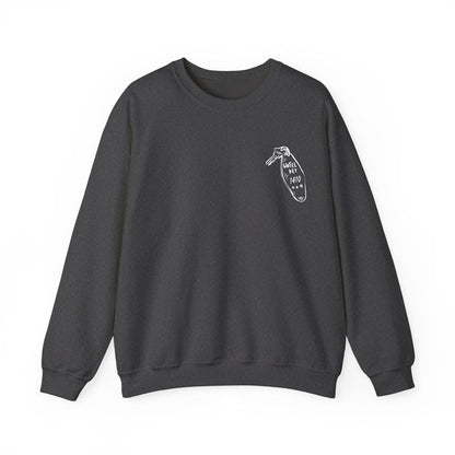 Thtgrlreads oversized crewneck sweatshirt from the Hockey Romance collection featuring a minimalist vintage white graphic on dark Comfort Colors fabric, combining cozy style with bookish flair.