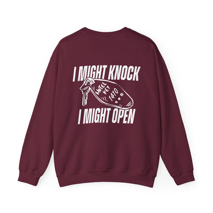 Burgundy oversized crewneck sweatshirt from thtgrlreads featuring bold white graphic text and a vintage-style key illustration, part of the Hockey Romance and Crewnecks collections.