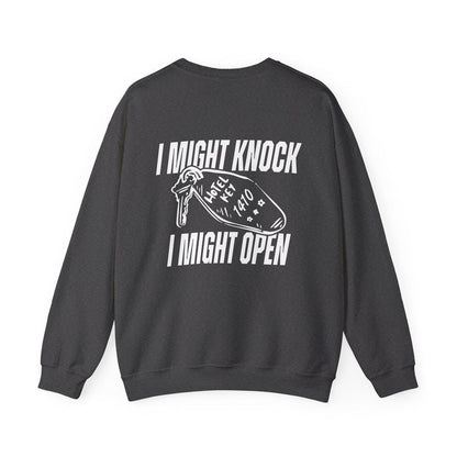 thtgrlreads oversized crewneck sweatshirt in vintage black with bold white text graphic "I Might Knock I Might Open" and a hotel key illustration on the back.