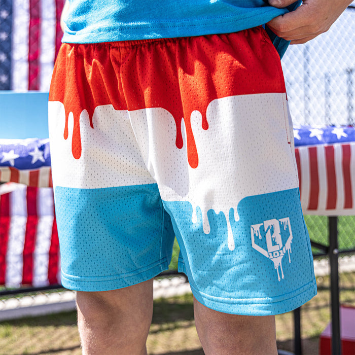 Adult model wearing red Ice Cream Freeze Pop shorts