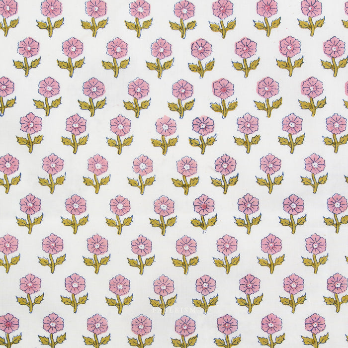 Floral patterned fabric with 'Fableism' branding on a white background. Indian Block Prints available at globalfibershop.com.