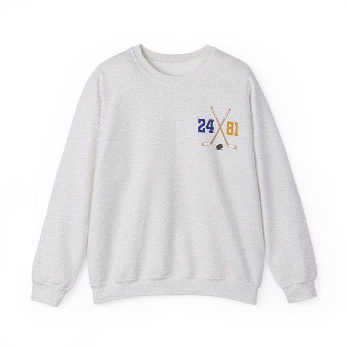 A vintage wash Comfort Colors crewneck sweatshirt by thtgrlreads featuring a small crossed hockey sticks graphic with numbers 24 and 81, part of the Hockey Romance collection.