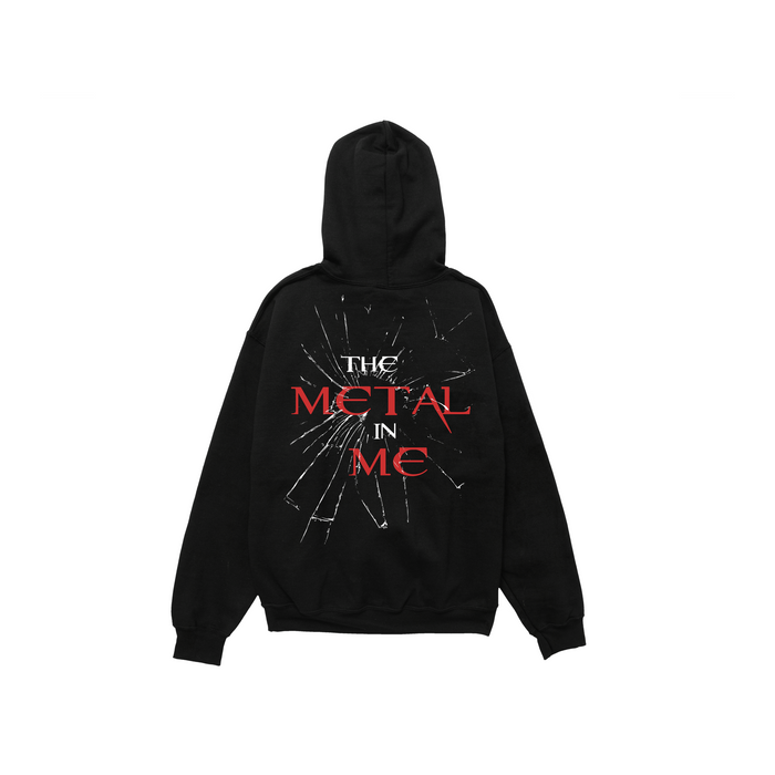Black pullover on a white background. Back print says THE METAL IN ME with glass shatter effect.