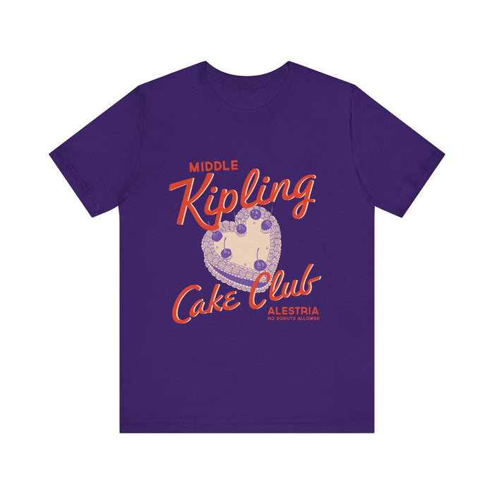 Thtgrlreads Ruthless Boys of the Zodiac collection features a purple Comfort Colors fitted tee with a vintage-style graphic reading "Middle Kipling Cake Club" and a heart-shaped cake illustration.