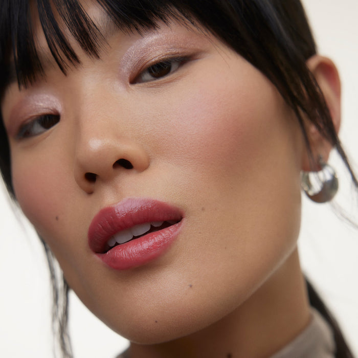 Wonderblush-Le Baume Tinted Lip Balm-Makeup-LeBaume-ModelLightSkin-Aurore-The Detox Market | Aurore - Cherry blossom pink