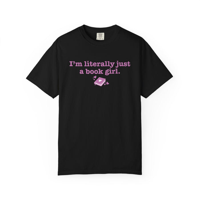 Black Comfort Colors graphic tee from thtgrlreads featuring vintage-wash cotton with a pink printed design that reads "I'm literally just a book girl" and a small heart-adorned book graphic, part of the Book Bestie and Tees collections.