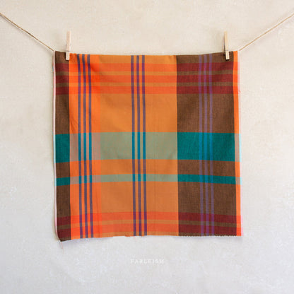 Tangerine and teal plaid from Lumiere by Fableism Supply Co. available at globalfibershop.com.