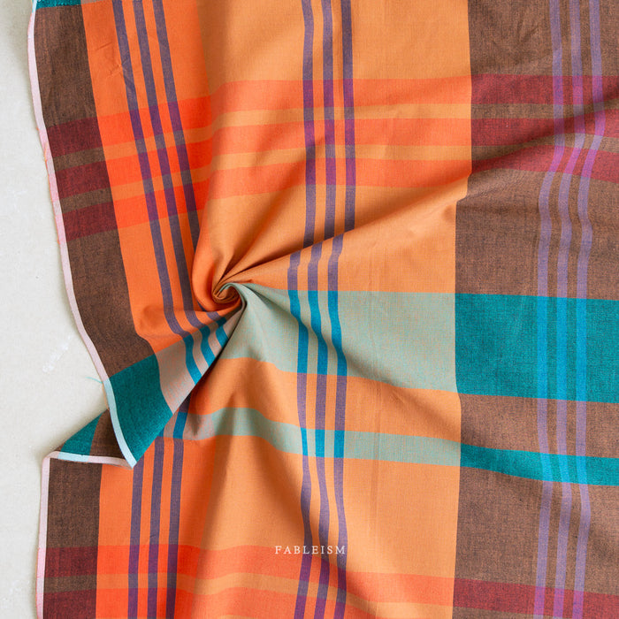 Tangerine and teal plaid from Lumiere by Fableism Supply Co. available at globalfibershop.com.
