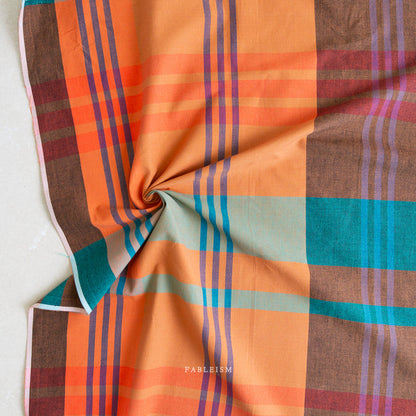 Tangerine and teal plaid from Lumiere by Fableism Supply Co. available at globalfibershop.com.