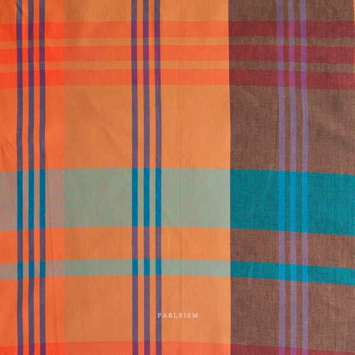 Tangerine and teal plaid from Lumiere by Fableism Supply Co. available at globalfibershop.com.