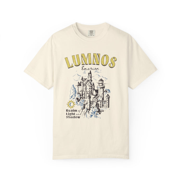 Thtgrlreads Kindred's Curse Saga unisex Comfort Colors graphic tee in vintage wash featuring a detailed castle illustration and "Lumnos" text with a fantasy bookish theme.