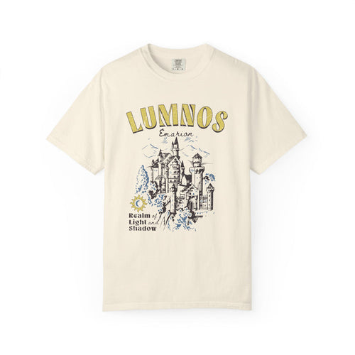 Thtgrlreads Kindred's Curse Saga unisex Comfort Colors graphic tee in vintage wash featuring a detailed castle illustration and "Lumnos" text with a fantasy bookish theme.