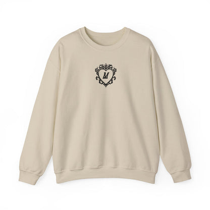 thtgrlreads cream Comfort Colors oversized crewneck sweatshirt featuring a black vintage-style ornate heart design with a bold letter M in the center on the chest