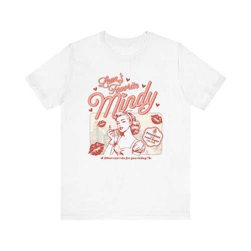 Thtgrlreads Ruthless Boys of the Zodiac collection Comfort Colors graphic tee featuring a vintage-inspired retro print with "Mindy" text and stylized female character design.