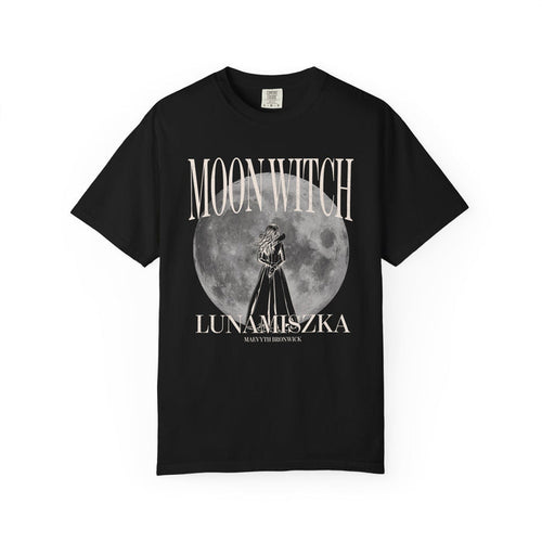 Thtgrlreads officially licensed Moon Witch Comfort Colors graphic tee from The Eating Woods collection featuring vintage-wash black fabric with a large moon and witch illustration in soft gothic fonts.