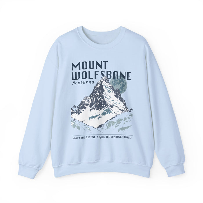 thtgrlreads Wolves of Ruin collection oversized crewneck sweatshirt in light blue with vintage-style mountain graphic and bold text, featuring premium Comfort Colors fabric.