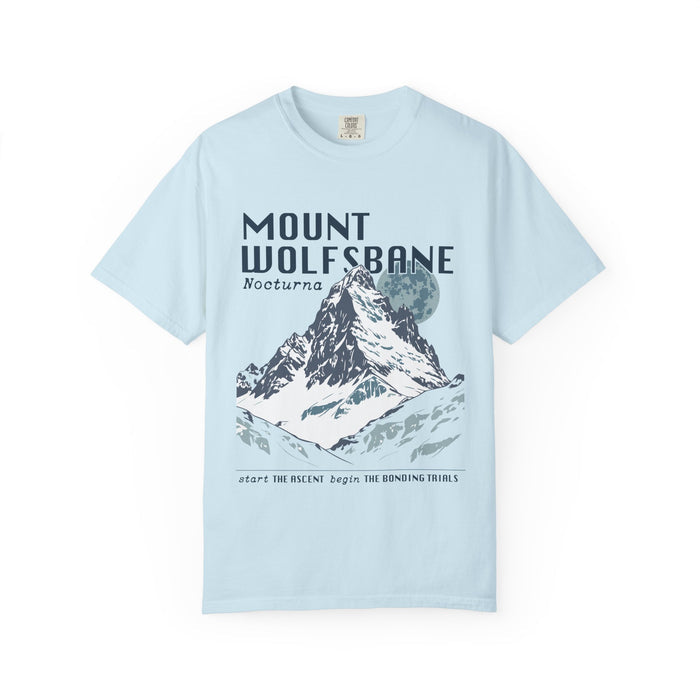 Thtgrlreads comfort colors graphic tee from the Wolves of Ruin collection featuring a vintage wash light blue fabric with a bold mountain print and stylized text referencing Mount Wolfsbane.