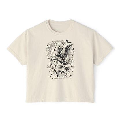 thtgrlreads Liv Zander collection cream comfort colors crop top featuring a dark romantasy design of a flying angler fish surrounded by skulls and bats, printed by Printify.