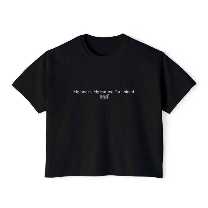 A black vintage-wash Comfort Colors cropped t-shirt from thtgrlreads featuring minimalist white text reading "My heart. My bones. Our blood." with a small decorative symbol, part of The Poison Daughter collection.