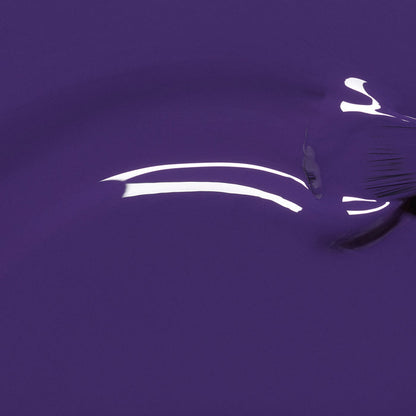 Mystic by Manucurist features a glossy blue-violet nail polish with an opaque finish, white reflected highlights, and subtle texture on the right side.