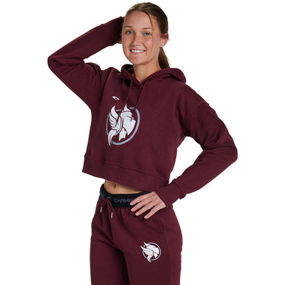 A woman wearing a Champro Sports National Softball Association NSA Home Plate Women's Crop Hoodie.