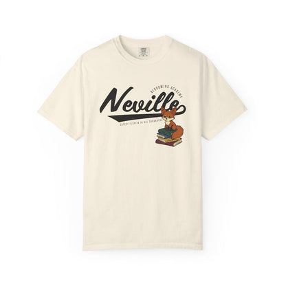 thtgrlreads cream-colored Comfort Colors graphic tee featuring "Neville" in bold script with a vintage puff print of a small fox sitting on stacked books, evoking a cozy literary theme.
