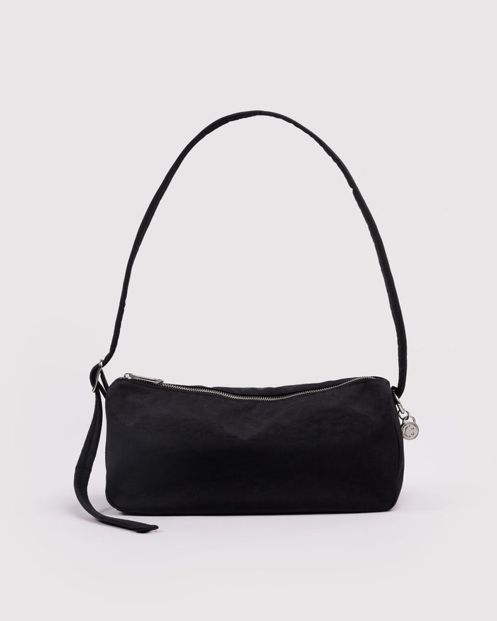 Black nylon loaf bag with curved top handle, side strap, and top zipper.