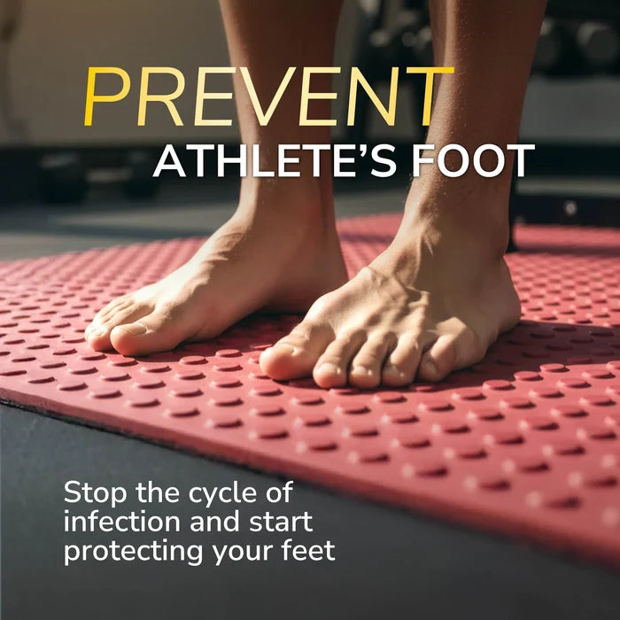 Athlete’s foot prevention powder concept with bare feet on rubber exercise mat