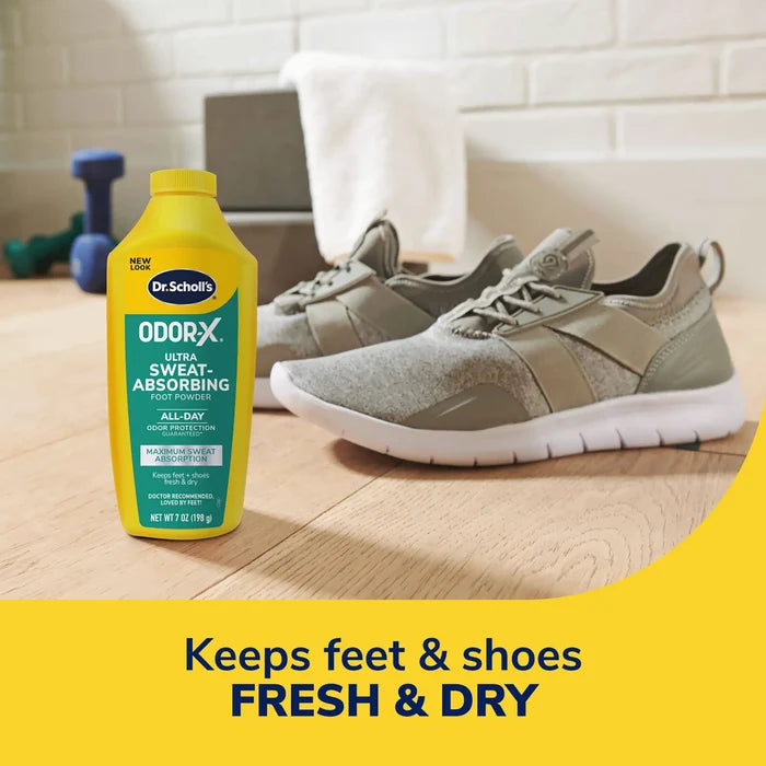 Odor-X Ultra Sweat-Absorbing Foot Powder next to sneakers and white towel