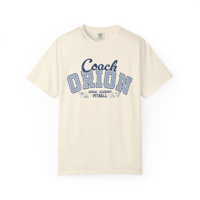 Vintage-wash Comfort Colors graphic tee from thtgrlreads featuring a “Coach Orion” varsity-style print, part of the Zodiac Academy collection unisex tees with premium soft fabric.