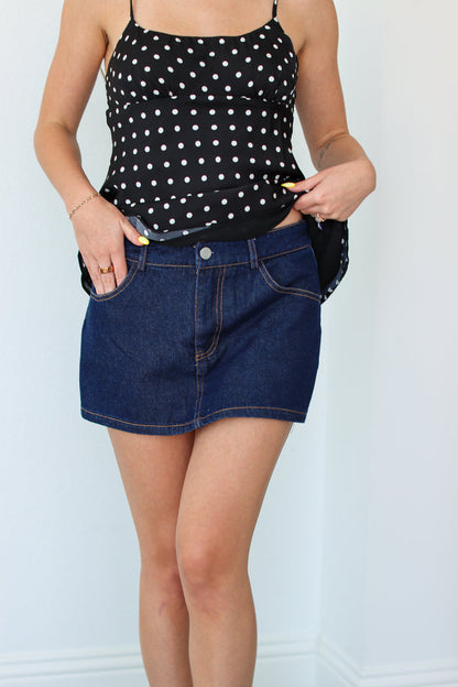 Woman wearing a denim mini skort