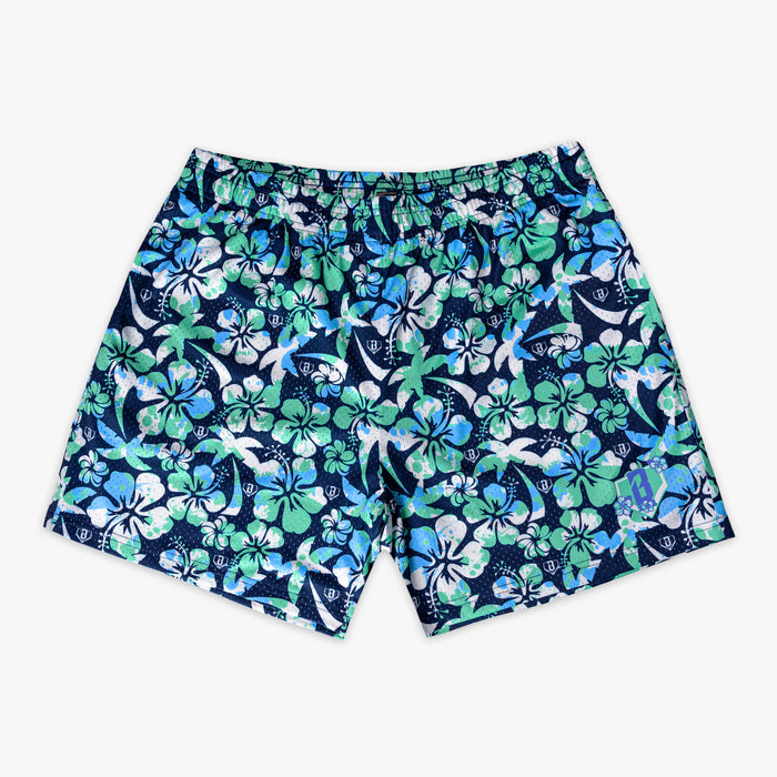 Navy blue shorts with a green, blue and white floral pattern on a white background