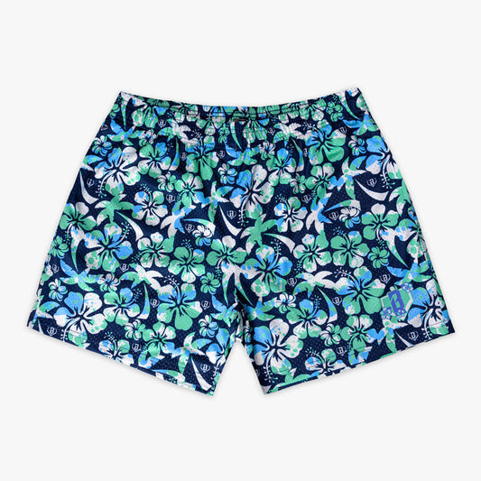 Navy blue shorts with a green, blue and white floral pattern on a white background