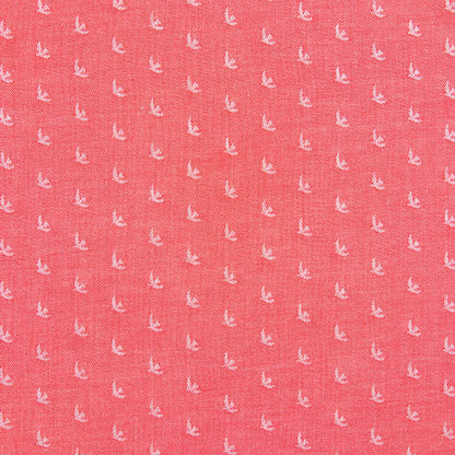 Pink fabric with small white bird pattern