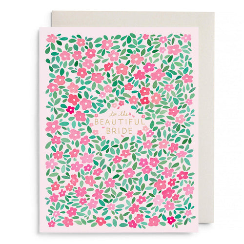 Bridal greeting card with pink floral leaves and “to the beautiful bride” text.