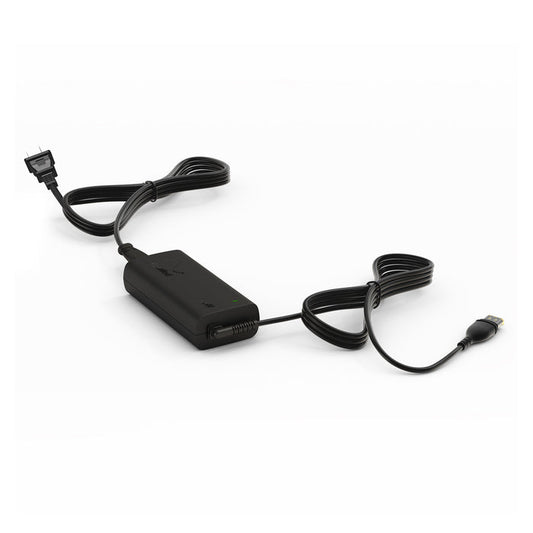 ResMed AirSense 11 power supply, a black rectangular adapter with an attached power cord and a green indicator light.