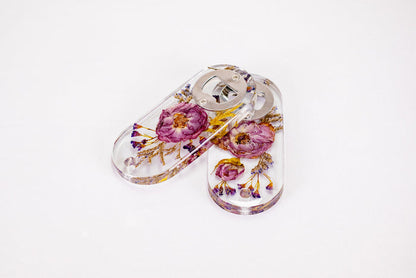 Landscape photo of a pressed flower large bookend set with soft dried botanical layers