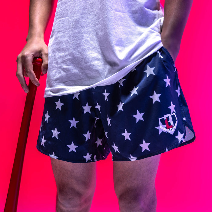 Adult model wearing navy Pro Series Freedom shorts