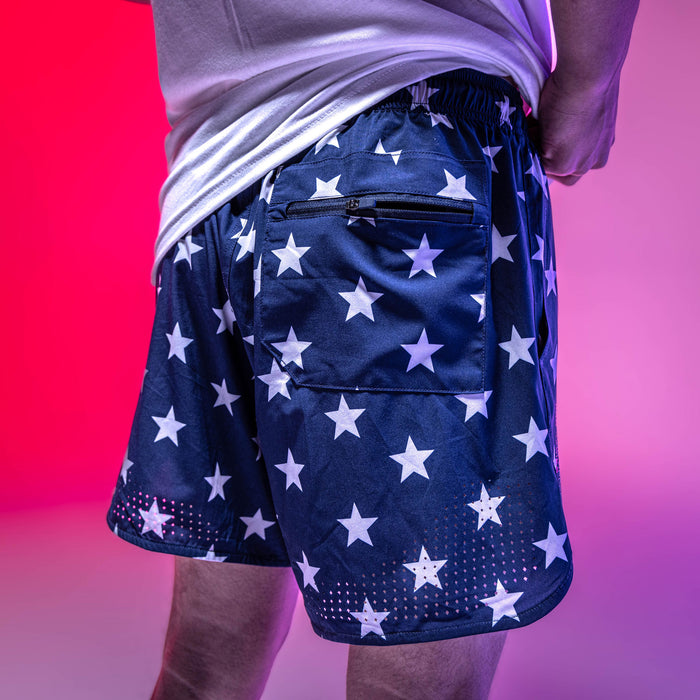 Adult model wearing navy Pro Series Freedom shorts