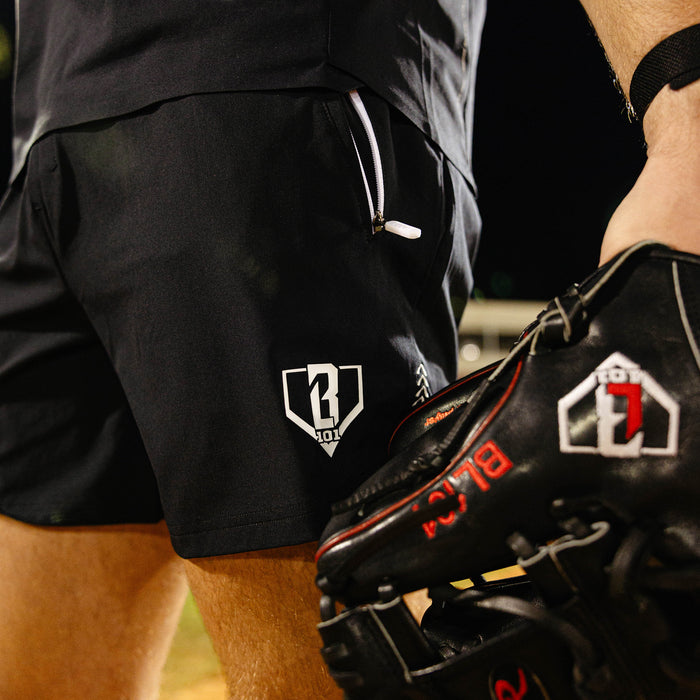 Youth model wearing black and white Pro Series with Liner youth shorts