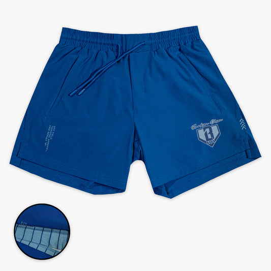 Blue shorts with a small BL101 Jackson Olson logo on a white background