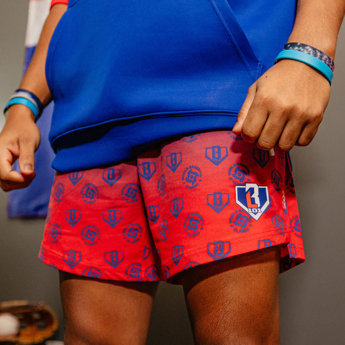 Adult model wearing multi-color Pro Series with Liner Dominican Republic shorts