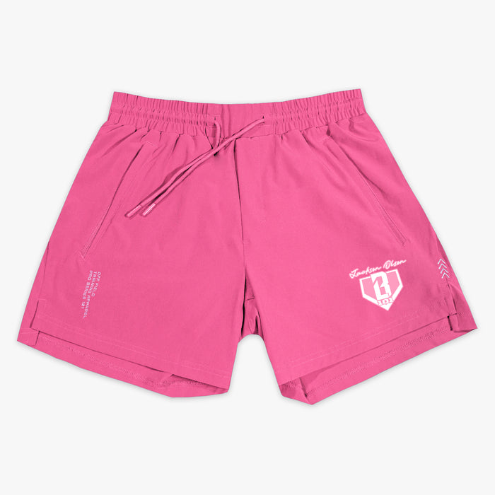 Pink shorts with a Jackson Olson BL101 logo on a white background