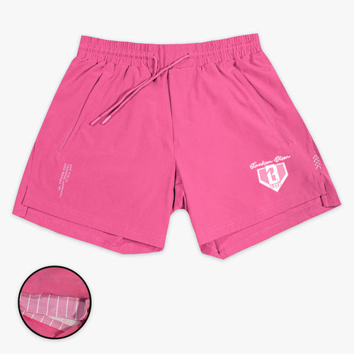 Pink shorts with a Jackson Olson BL101 logo on a white background