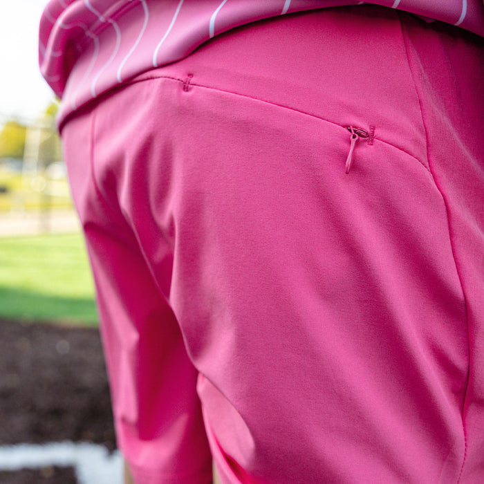 Close-up of the back zip pocket on the youth pink Pro Series Shorts V2