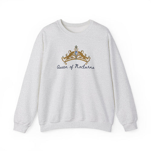Thtgrlreads Wolves of Ruin officially licensed oversized crewneck sweatshirt featuring a vintage washed Comfort Colors fabric with an embroidered gold crown and gothic script text reading "Queen of Nocturna".