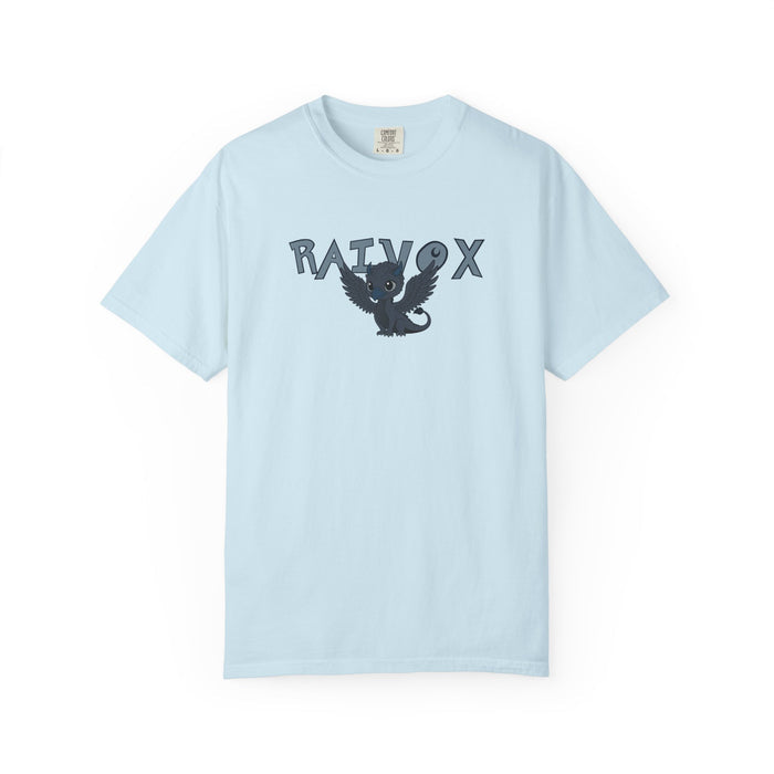 A light blue Comfort Colors graphic tee from thtgrlreads featuring a vintage wash and a whimsical black bird with spread wings centered between bold "Raivox" text, part of The Eating Woods collection.