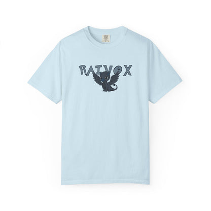 A light blue Comfort Colors graphic tee from thtgrlreads featuring a vintage wash and a whimsical black bird with spread wings centered between bold "Raivox" text, part of The Eating Woods collection.