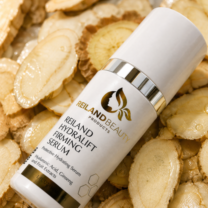 Reiland Beauty Products HydraLift Firming Serum bottle displayed on dewy snow mushroom slices, highlighting hyaluronic acid, ginseng, and fruit extracts for hydrating, firmer-looking skin.